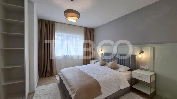 Penthouse lux ultrafinisat dotat si mobilat 2 nivele 131 mp si terasa — fotografia 3