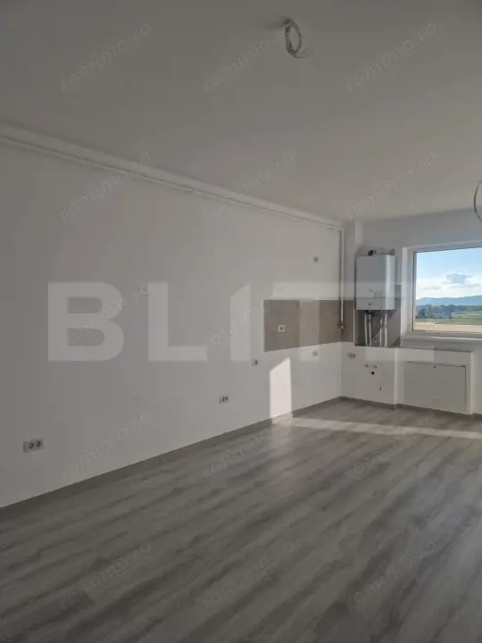 Garsonieră de vânzare în Sânpetru – ideală pentru amenajare după propriul stil — fotografia 2