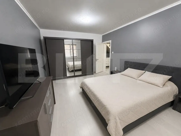 Apartament cu scară interioară, 100 mp, boxa si garaj, zona Central — fotografia 1