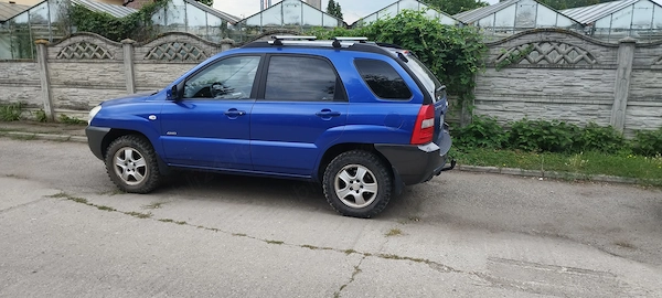 Kia Sportage și Ford c max