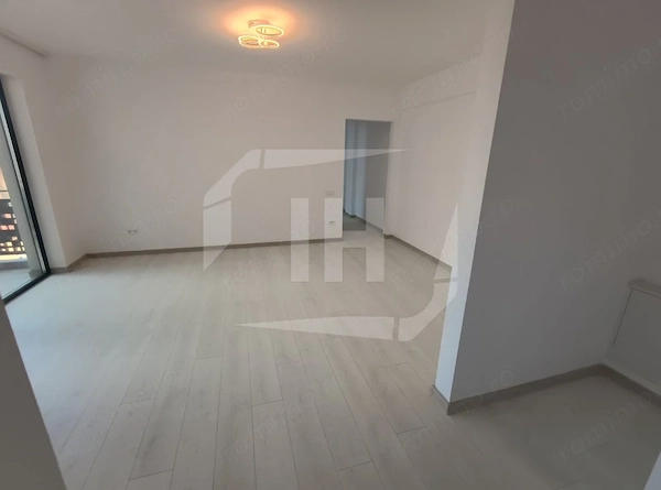 Apartament 3 camere, parcare, finisat, intermediar, curte, zona Pod Ira — fotografia 3