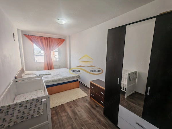 Vând apartament cu 3 camere decomandate in centrul orașului Bacau — fotografia 2