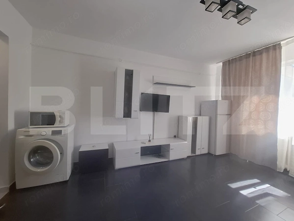 Garsonieră luminoasă, ideală pentru locuit sau investiție, în Astra — fotografia 1