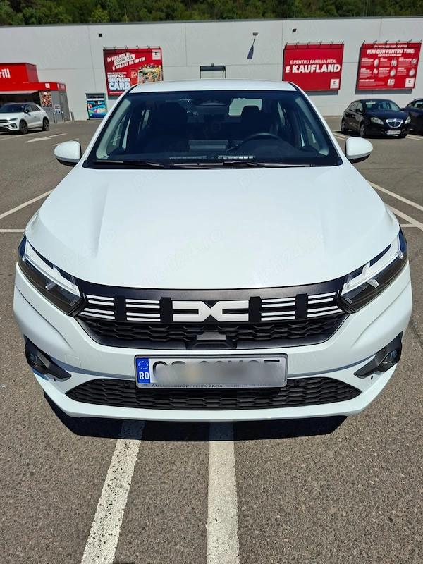 Vând Dacia Logan