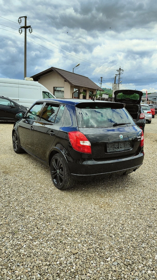 SKODA Fabia 2012 — imagine 10