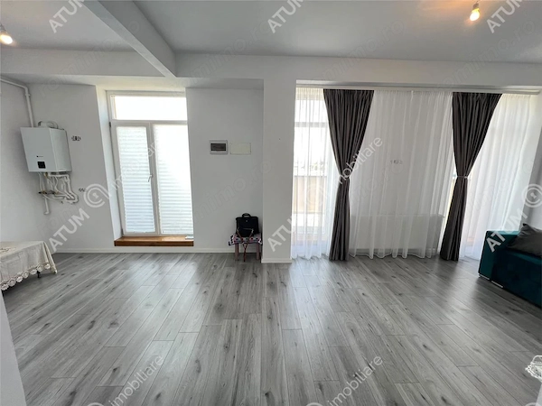 Apartament 2 camere terasa 2 locuri parcare zona Vasile Aaron Sibiu — fotografia 1