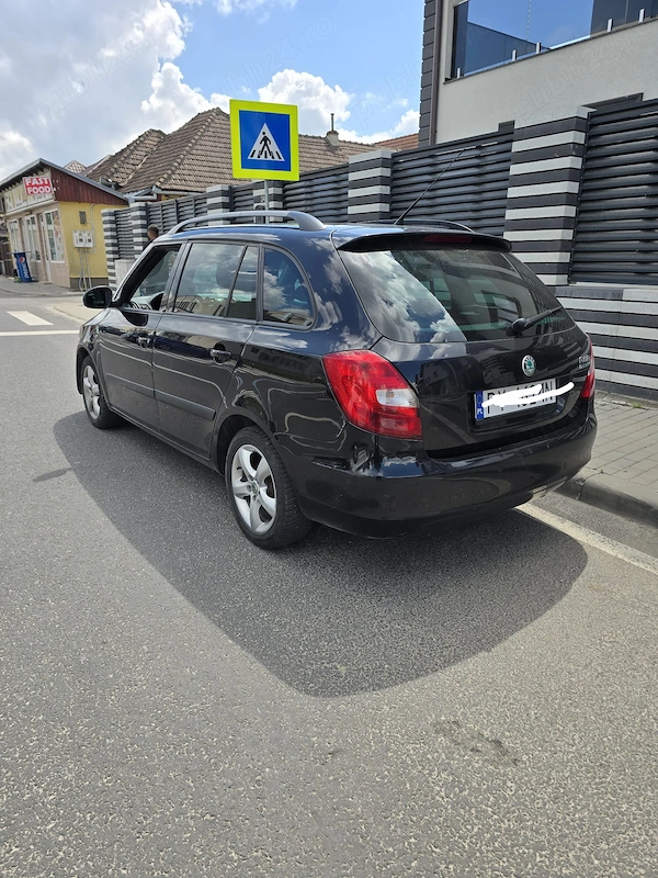 SKODA Fabia 2011 — imagine 4