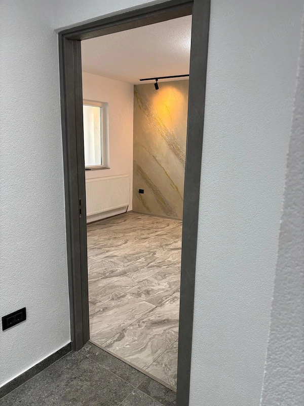 Vând apartament premium, renovat complet în 2026 Pașcani, zona Esplanadă | 55 mp | decomandat 80k — fotografia 3