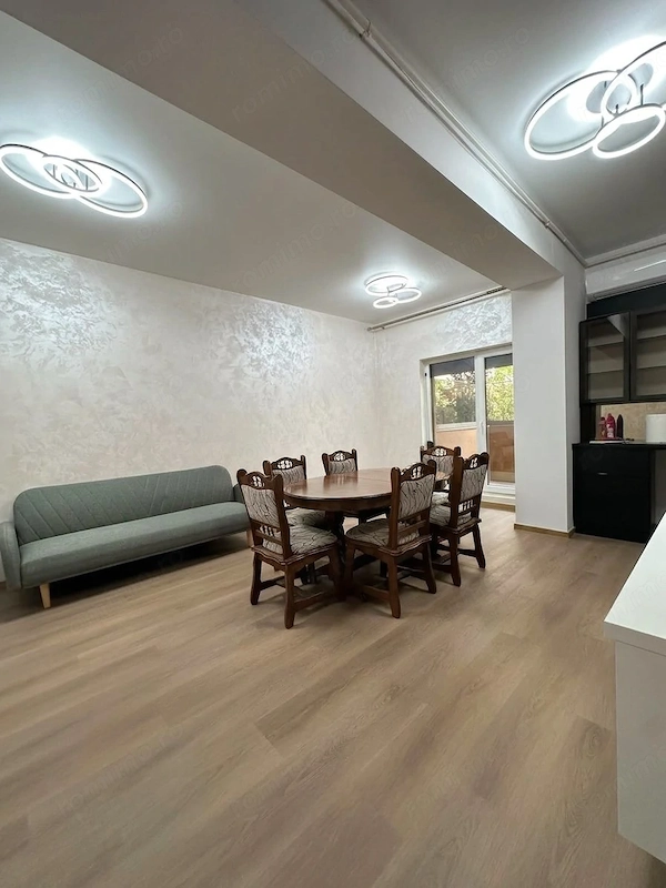 Apartament la parter, cu curte privată, terasă de 30 mp și 2 locuri de parcare — fotografia 2