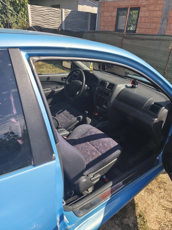 MAZDA 323 1999 — imagine 2