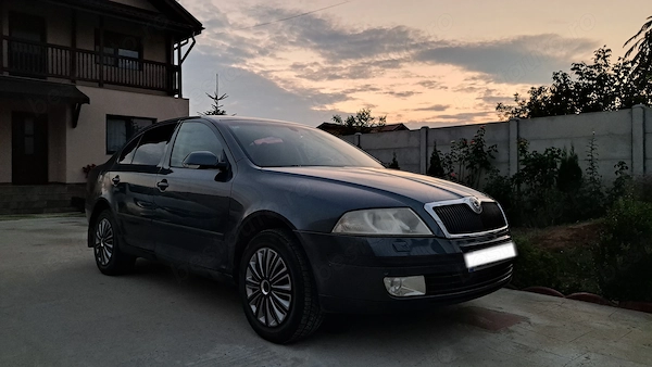 Skoda Octavia 2 (2006) 1.6 FSI , 115 CP