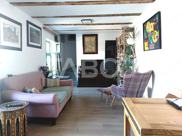 Apartament de vanzare 105 mp 3 camere curte 340 mp in acte Cisnadie — fotografia 1