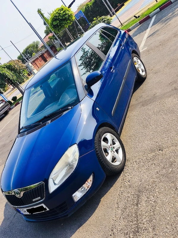 SKODA Fabia 2011 — imagine 4