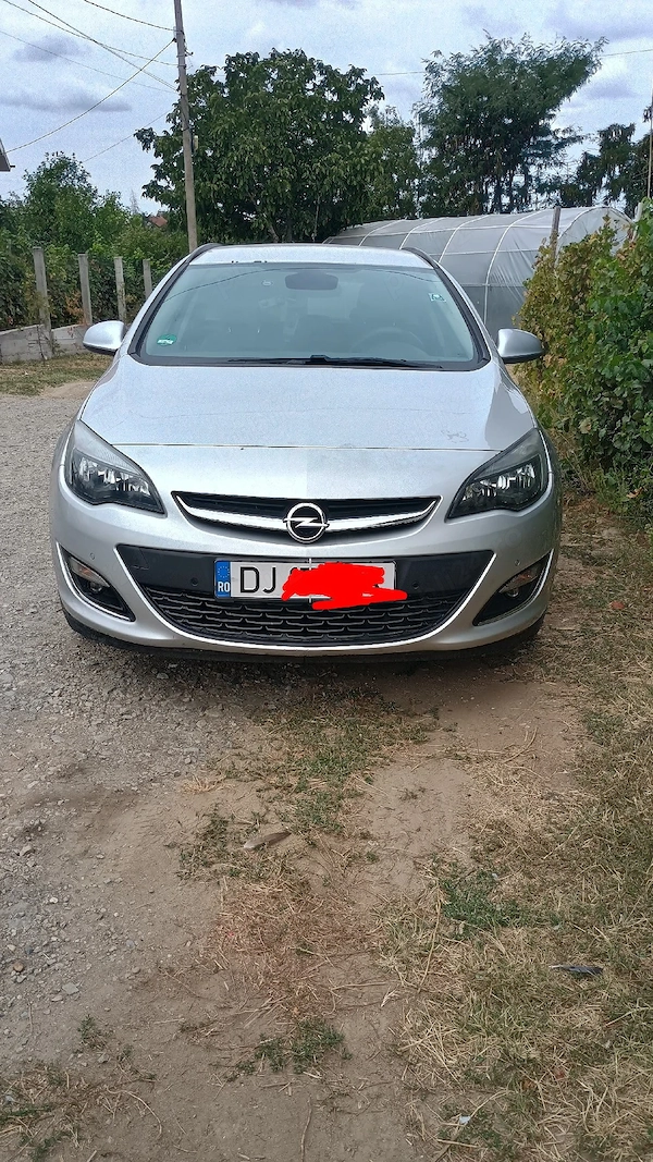 OPEL Astra 2013 — imagine 7