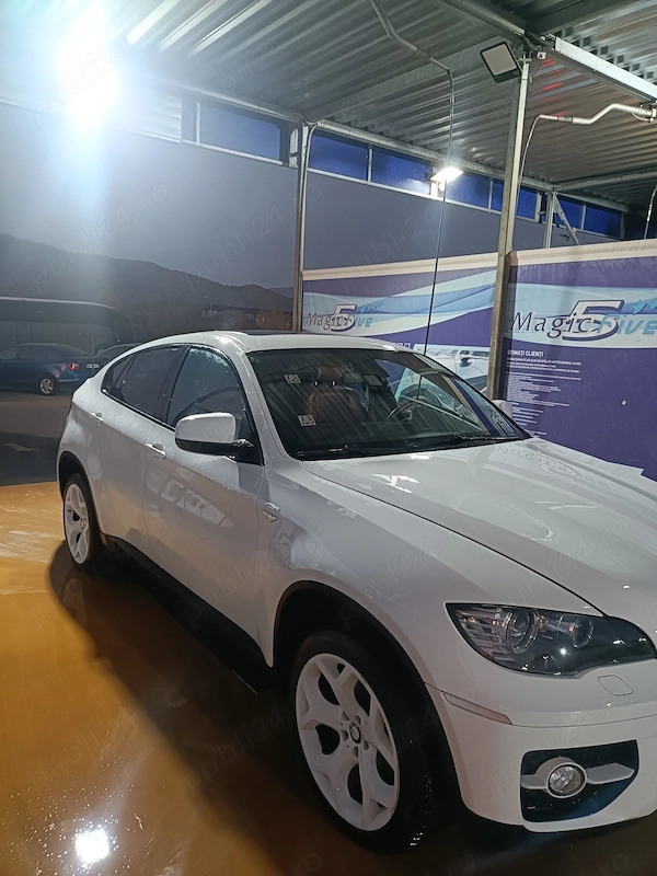 BMW  2010 — imagine 5