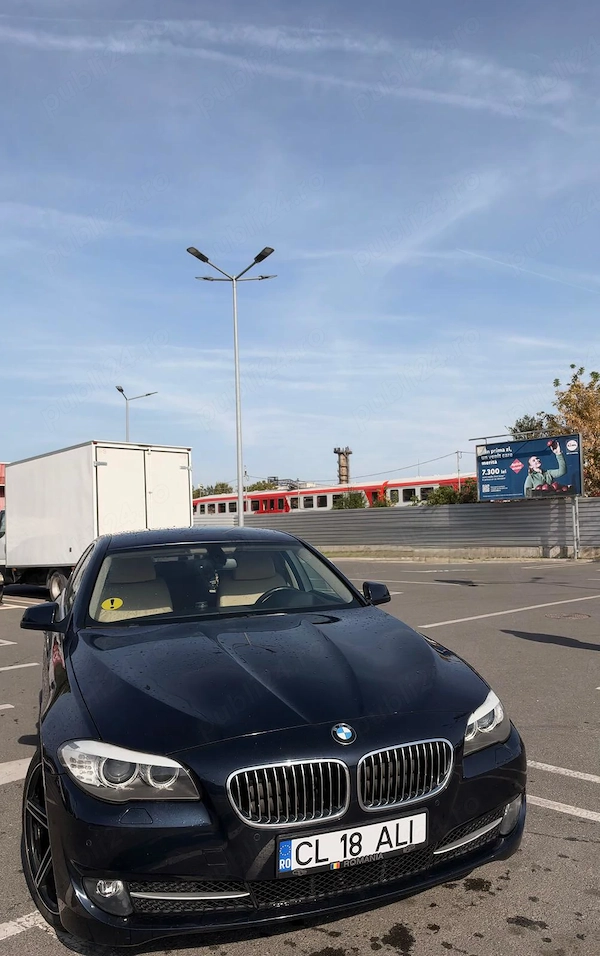 BMW Seria 5 2010 — imagine 2