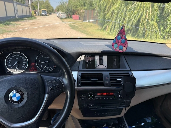 BMW X5 2010 — imagine 1