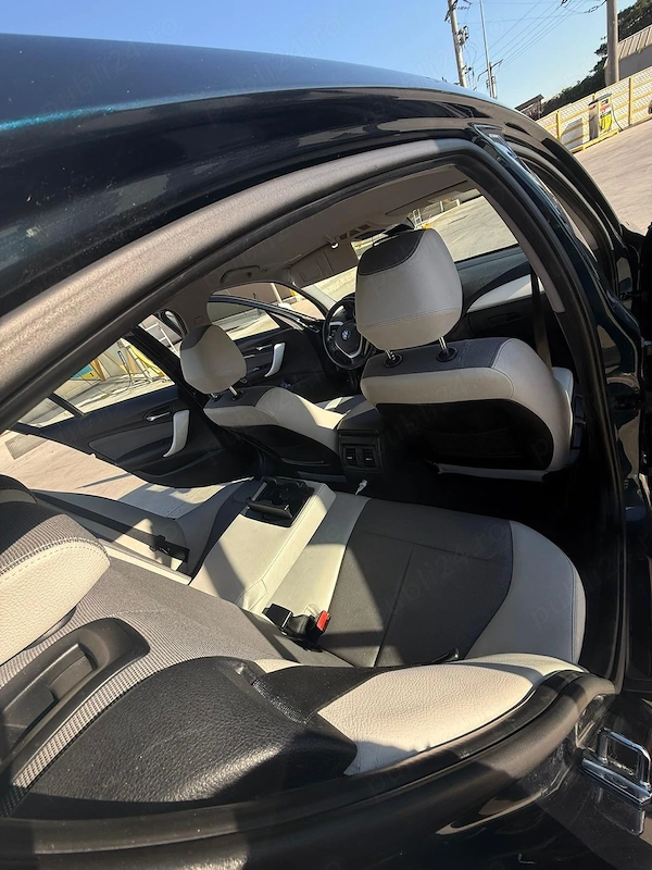 BMW Seria 1 2011 benzină, 4.800 € — imagine 9