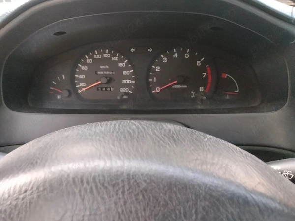 Nissan Almera 1997 benzină, 879 € — imagine 4
