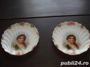 Vind 2 bucati farfuri unicat ce reprezinta TIGANCA.