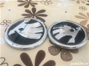 Vand embleme Skoda pentru capota motor si haion