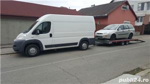 Tractari transport auto pe platforma 