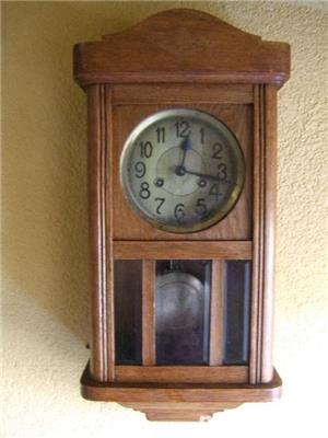 Ceas cu pendula din lemn