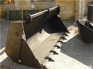 Cupa multifunctionala pentru orice buldoexcavator.