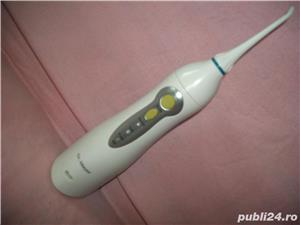 Aparate de curatat dintii - imagine 3