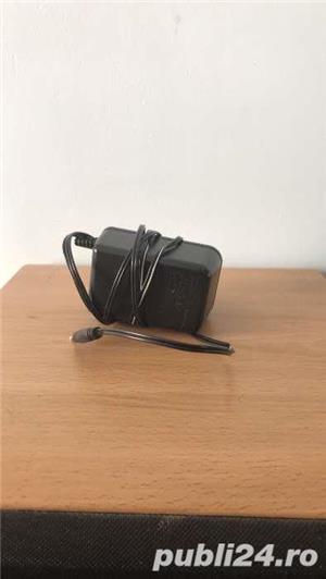 Vand incarcatoare de camera - imagine 5