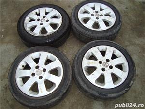 Set jante opel corsa c r15 - imagine 2