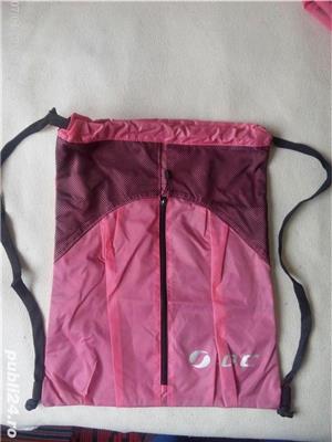 Rucsac cu fermoar din material rezistent,4 bucati,culoarea roz.Pret pt toate cele 4,75 lei 