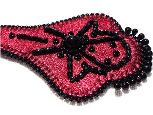 Cercei brodati pe piele - imagine 2