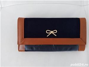 vand .Portofel Oceanica nou nout,calitate.