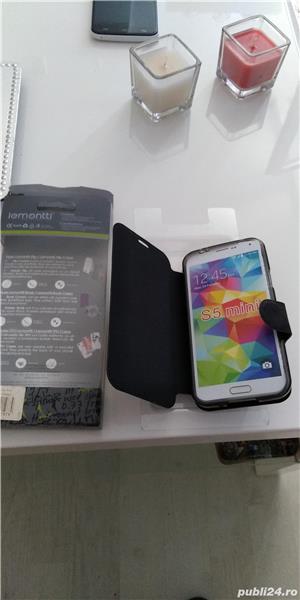 vand husa flip Samsung S5 mini,nou nouta,la cutie.