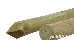 Stalpi de lemn, calibrati, ascutiti si tratati