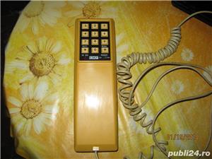 Canada telefon fix,fir lung,buton redail,led rosu =indica in use,perfect functional,mute ,on off ala