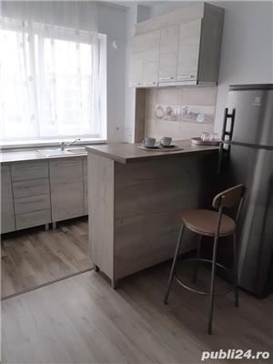 Dau inchirie apartament in regim hotelier - imagine 2