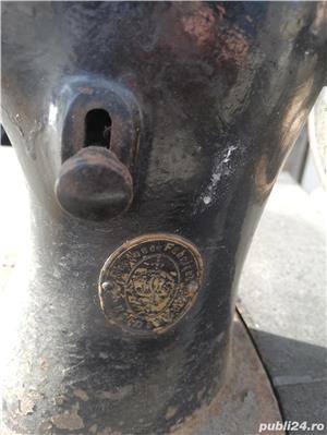 Masina de cusut Singer