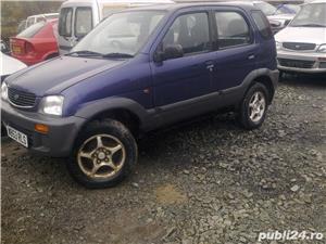 dezmembrez daihatsu terios 1.3 distributie curea bara capota portiera geam tripla bandou ornament - imagine 2