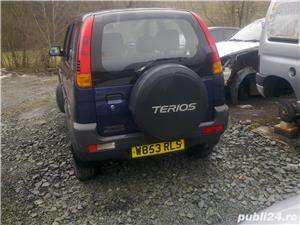 dezmembrez daihatsu terios 1.3 distributie curea bara capota portiera geam tripla bandou ornament - imagine 5