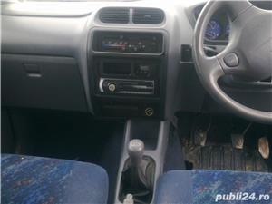 dezmembrez daihatsu terios 1.3 distributie curea bara capota portiera geam tripla bandou ornament - imagine 8