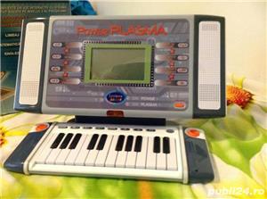 Laptop de jucarie cu orga