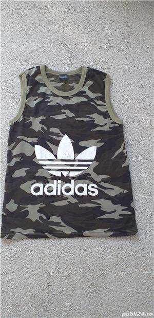 vand maieu sport produs de calitate,import,mar.M.in stare perfecta ,fara defecte,