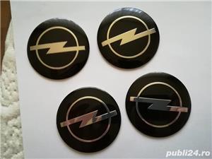 Set Capace/stickere/Embleme roți Opel diametrul 56 mm culoare pe negru - imagine 3