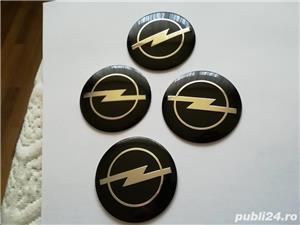 Set Capace/stickere/Embleme roți Opel diametrul 56 mm culoare pe negru - imagine 2