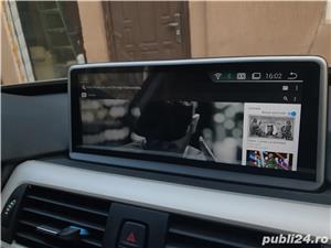 Firma Montez - instalez navigații dedicate gps dvd tetiere camere video boxe alarme senzori parcare - imagine 11