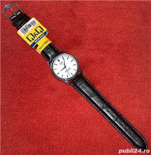 Q&Q, ceas de mână electric