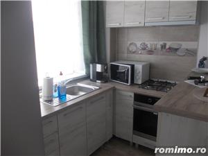 Dau inchirie apartament in regim hotelier - imagine 9