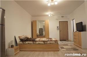 dau inchirie apartament in regim hotelier - imagine 12